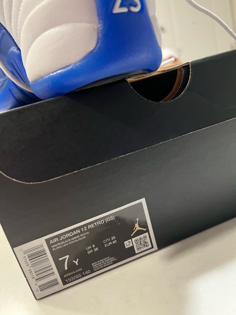 Jordan White and Royal Blue Retro 12 Sneakers - Picture 10 of 13